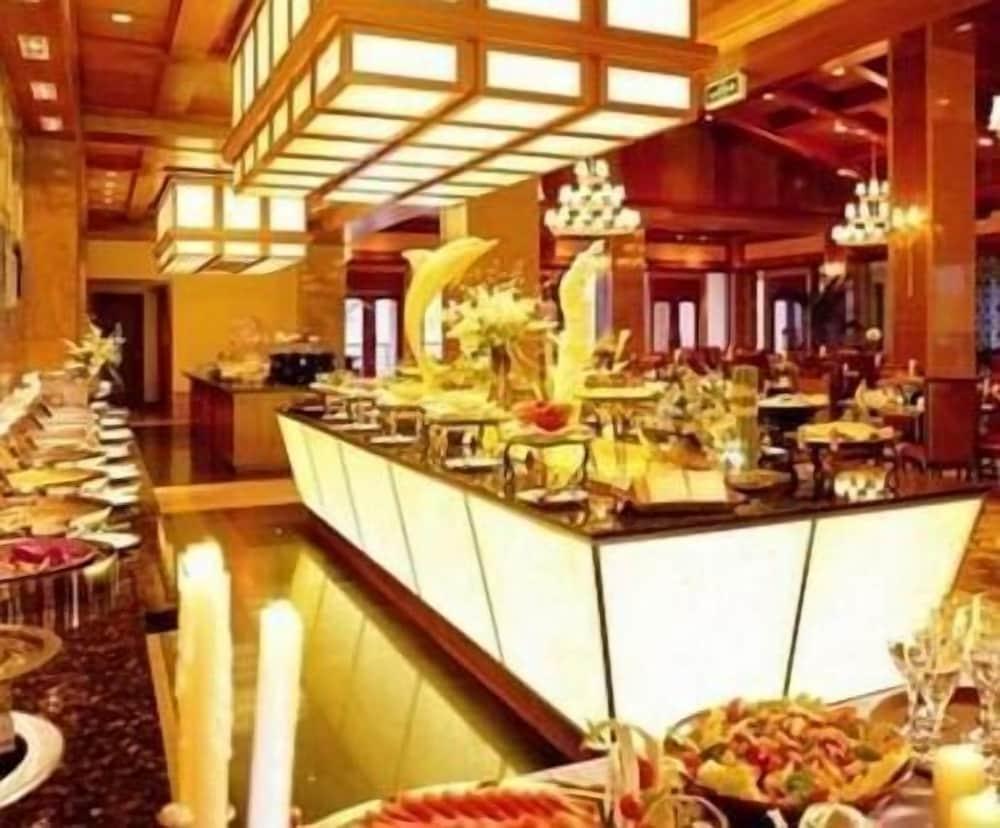 نيو سنتشري ريزورت كيانداو ليك هانجزهو تناول الإفطار