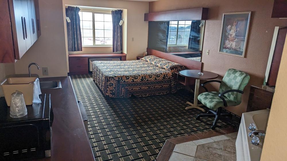 اسانت كلير إن آند سويتس غرفة