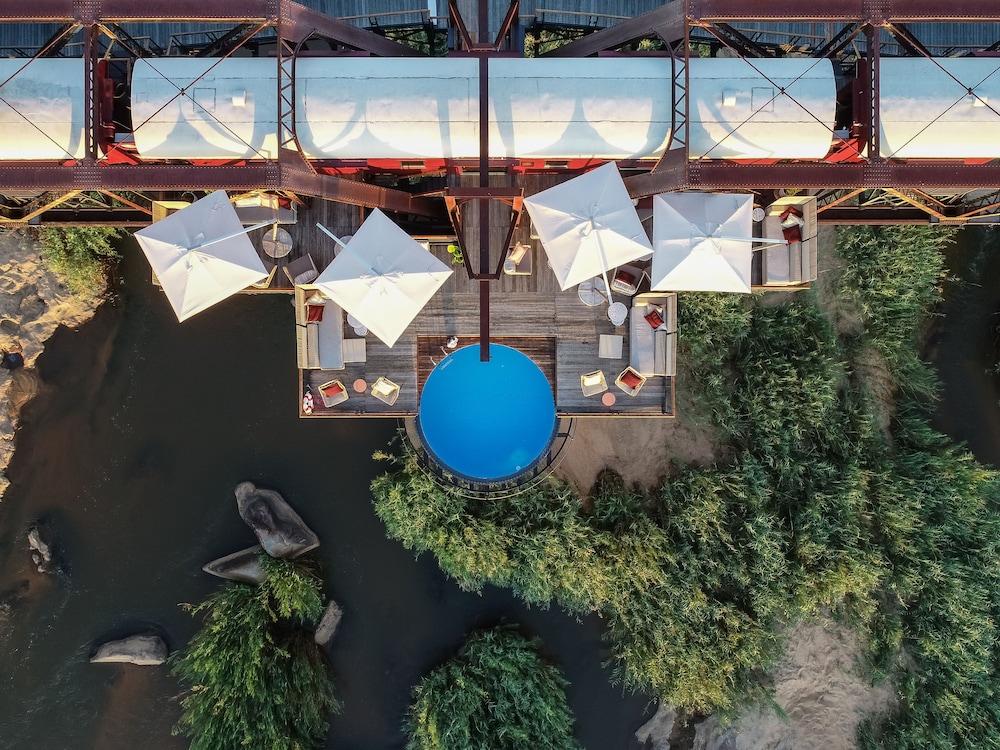 Kruger Shalati - Train on the Bridge and Garden Suites Aerial View