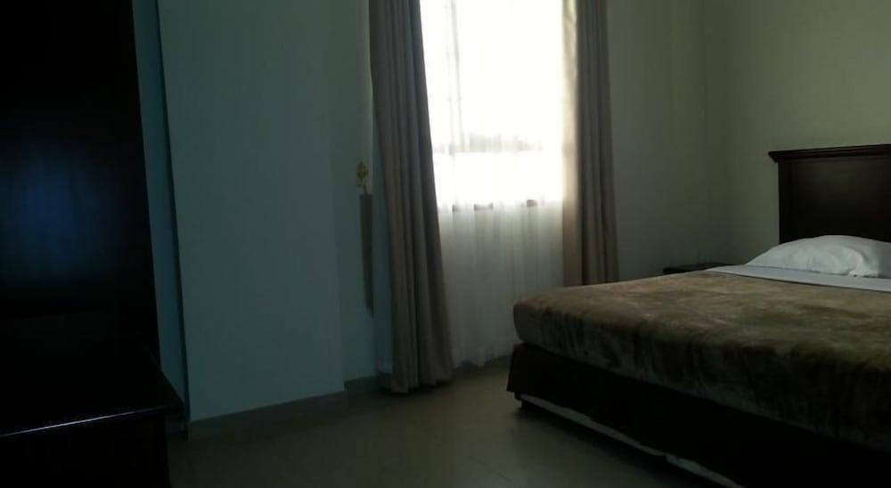 جرزيز للشقق الفندقية غرفة