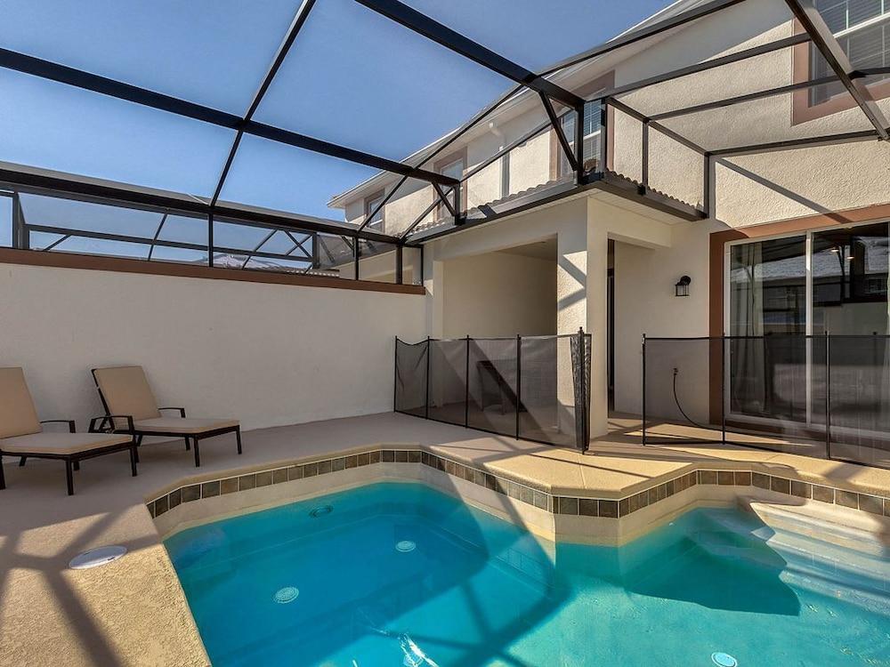 Marvelous 4 Bedroom w Screened Pool Close to Disney 1569 Featured Image