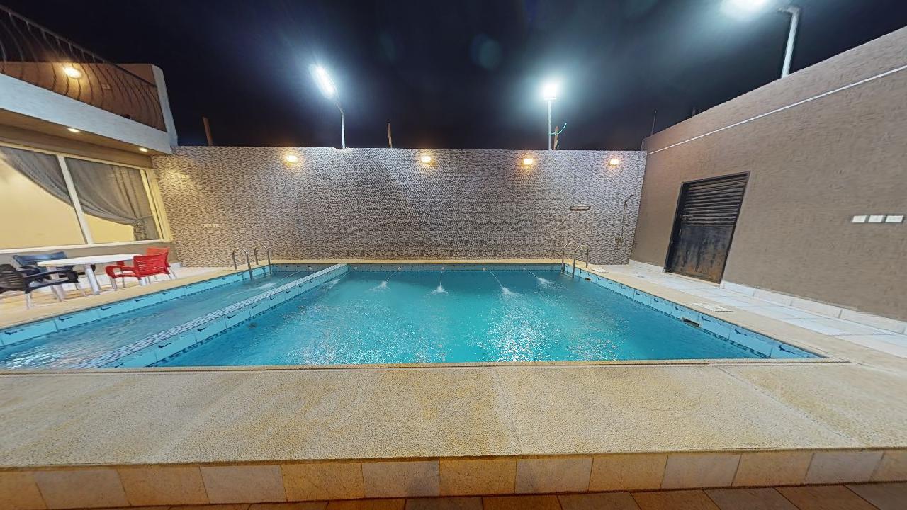 استراحة بتصميم أنيق ومسبح | 1499 الصورة الأساسية