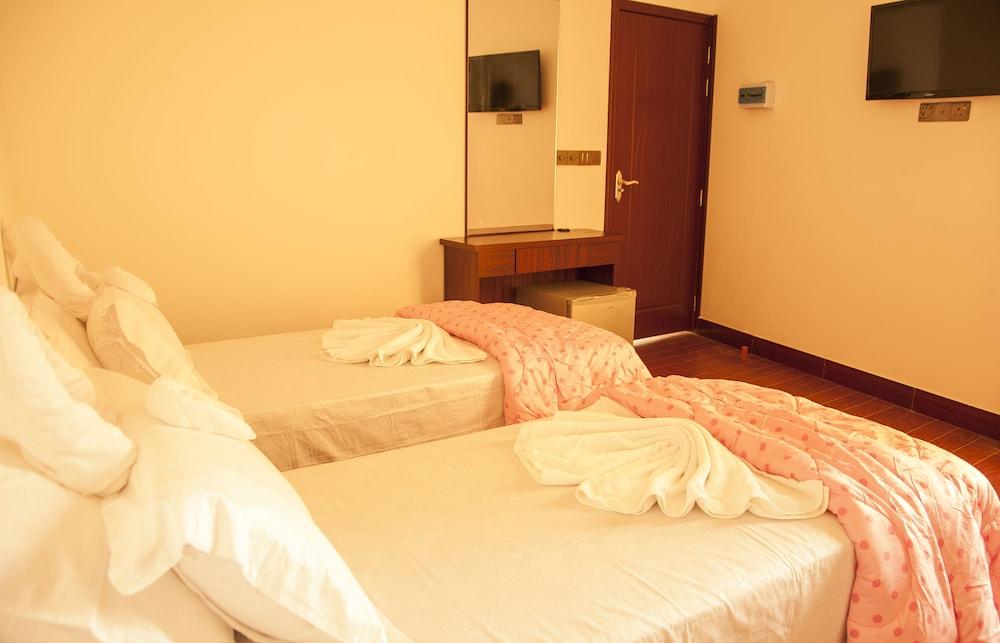 Guraidhoo Palm Inn Featured Image