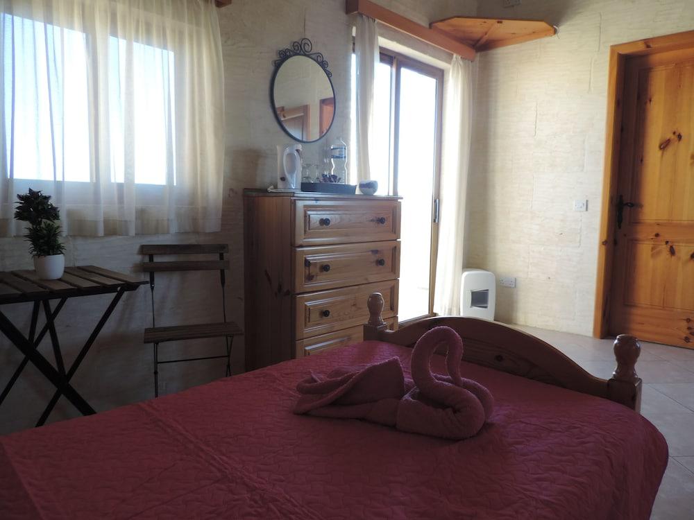 جوزو هوليداي هاوس غرفة