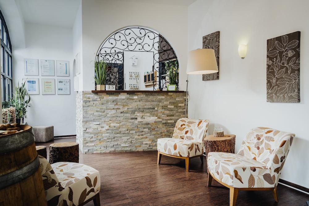 هوتل آند ريستورانت هسيشر هوف منطقة الجلوس في الردهة