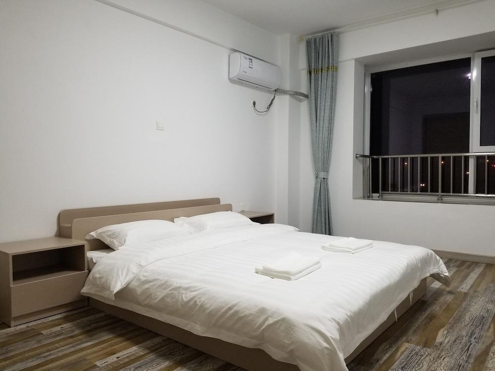 Rizhao M&S Aparthotel Room
