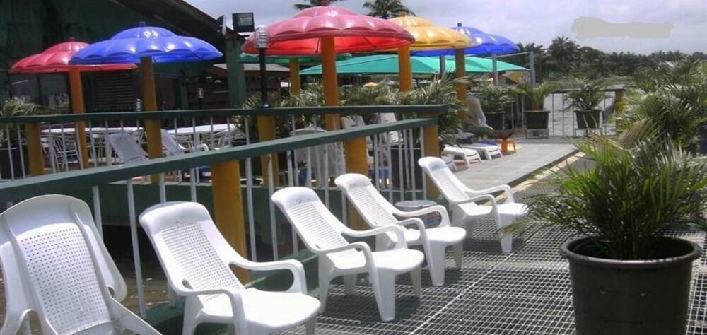 Whispering Palms Resort Sundeck