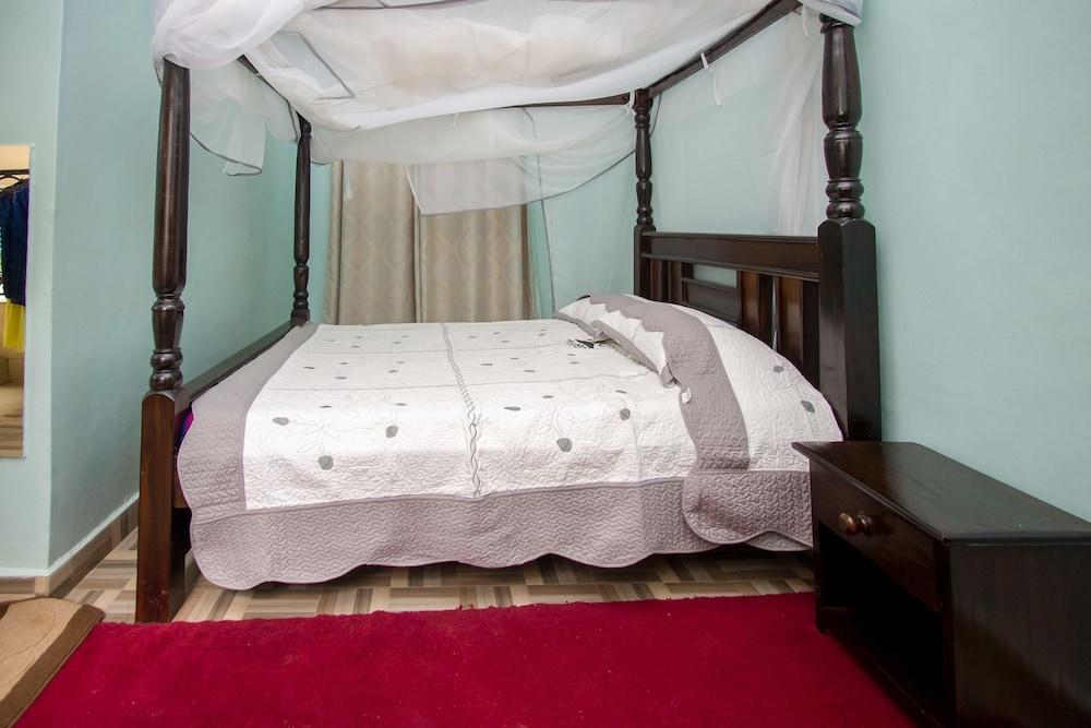 سلوبز فيلا هوتل غرفة