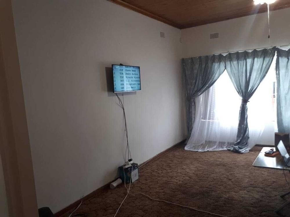 C - Land Guest House Lobby Sitting Area