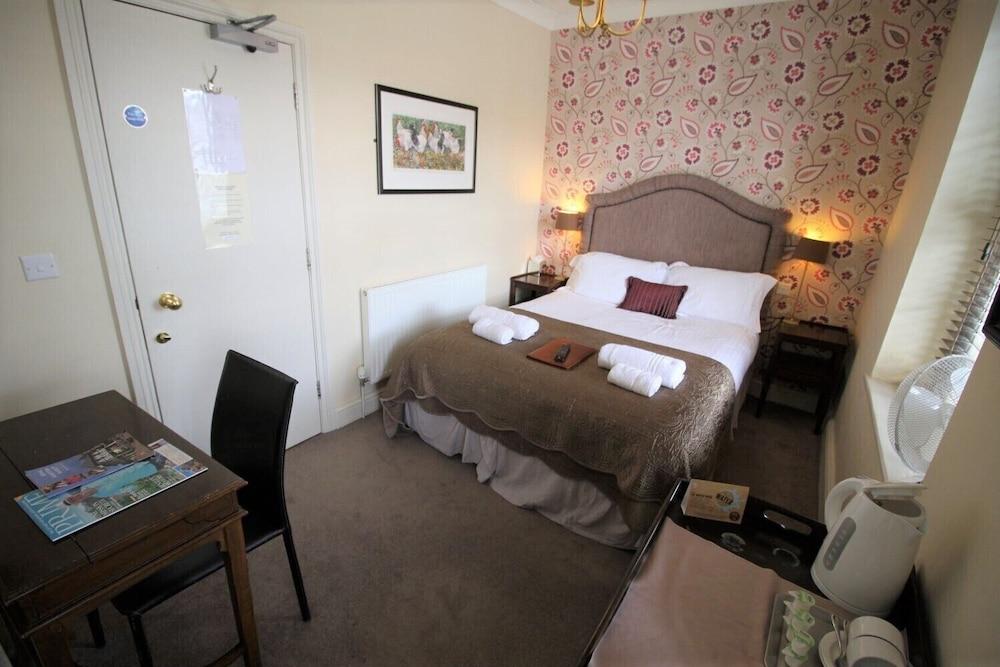 ذا آنجل هوتل غرفة