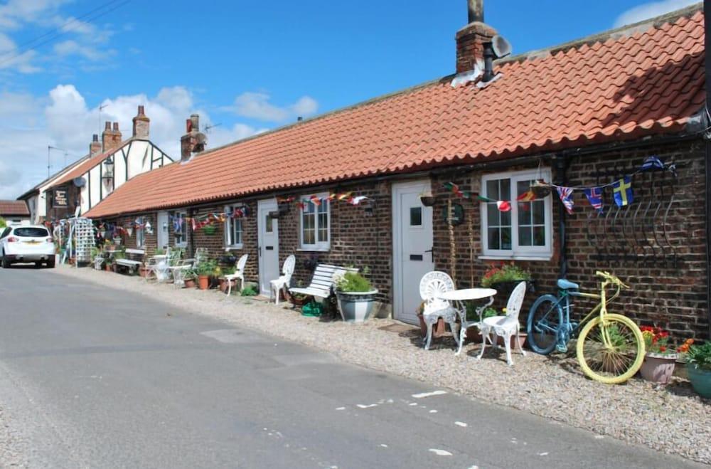 أو واي أو 1ارموم كوتيدجز المنطقة الخارجية