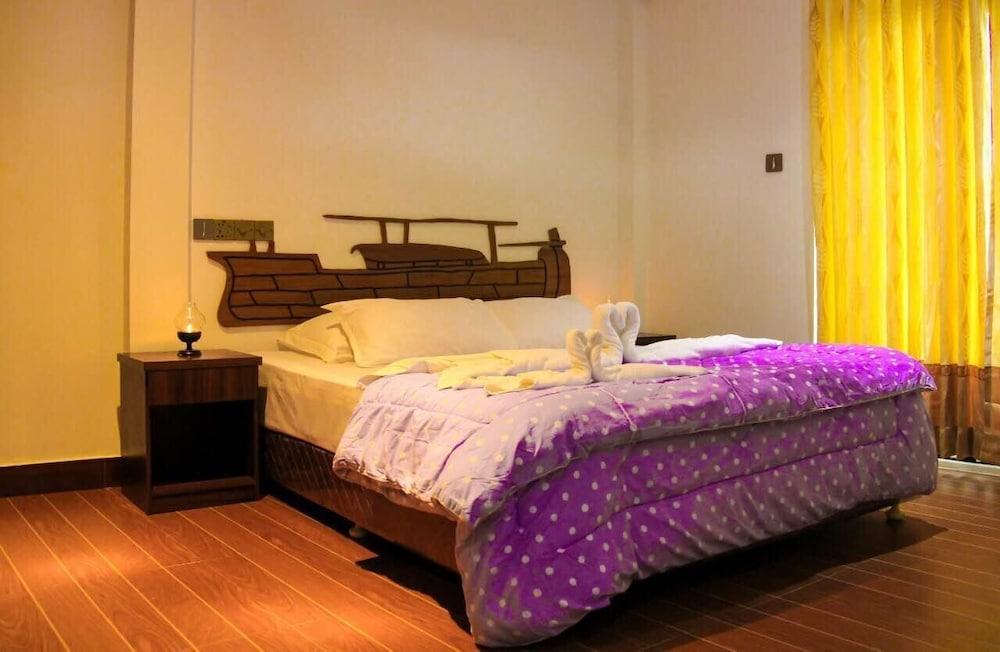Guraidhoo Palm Inn Room