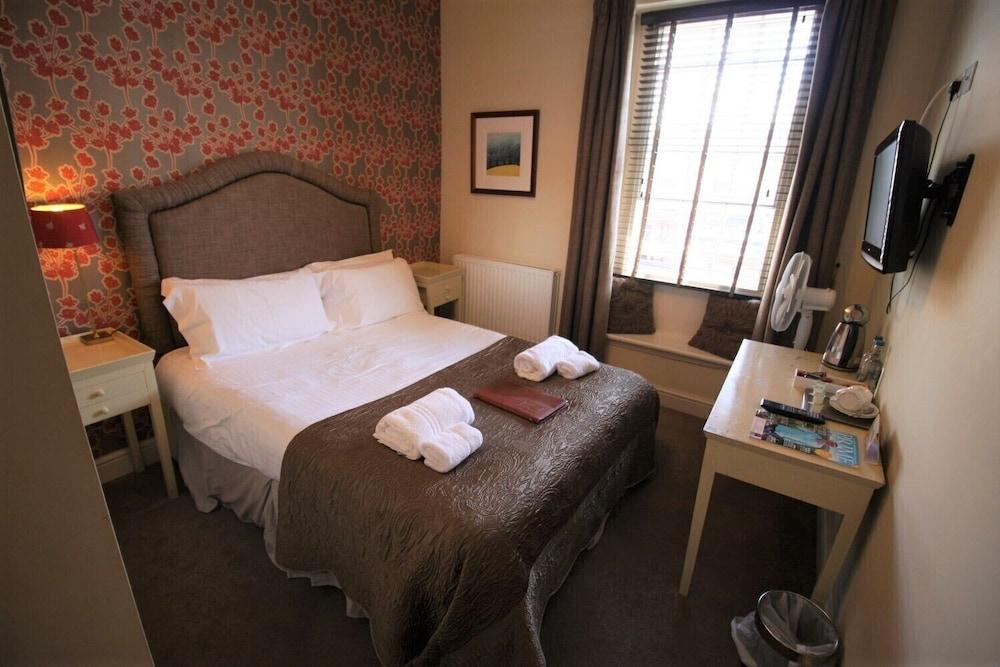 ذا آنجل هوتل غرفة