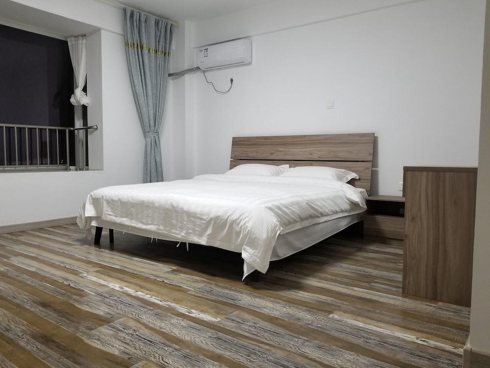 Rizhao M&S Aparthotel Room