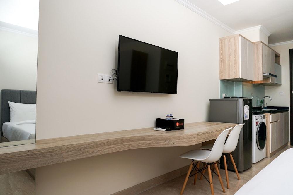 Trendy Studio at Menteng Park Apartment Television