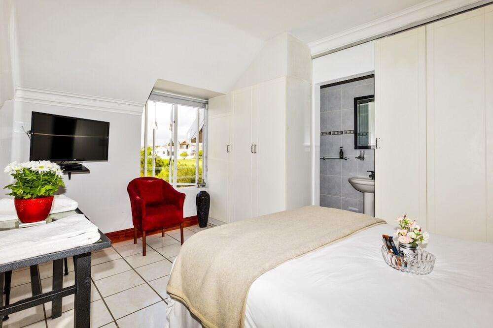 هوليداي جيستهاوس لانجيبان غرفة