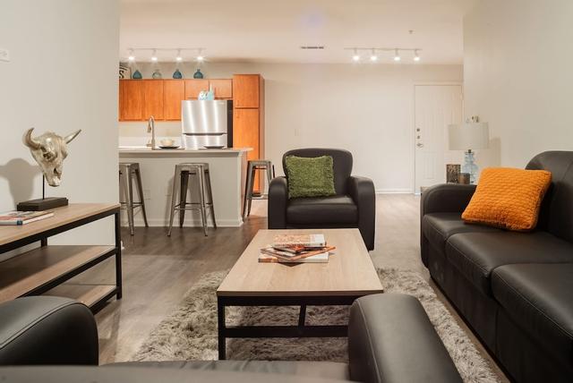 Modern Condo With Pool, Gym, Workspaces & BBQ